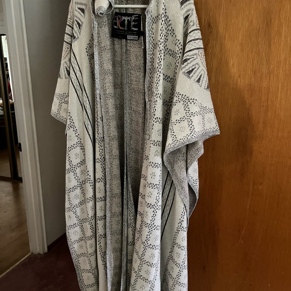 THIS IS AN ERTE CAPE WITH SILVER THREADING,& GREY COLORING